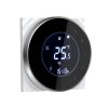 Smart thermostat for a gas boiler. Round black smart thermostat that can be controlled remotely and can be timed