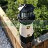 Solar powered lighthouse lamp with rotating lighting garden decoration black